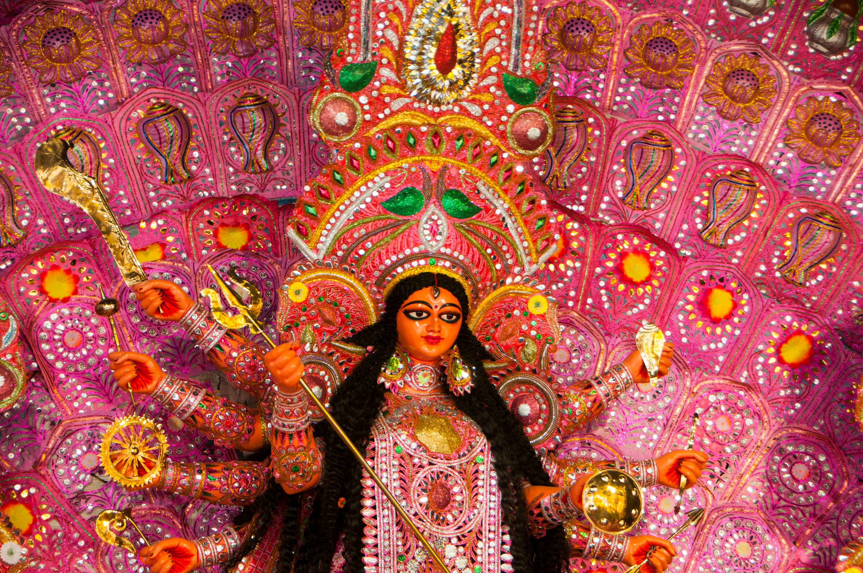 Maa Durga with trishul in spiritual pooja photoshoot, embodying strength